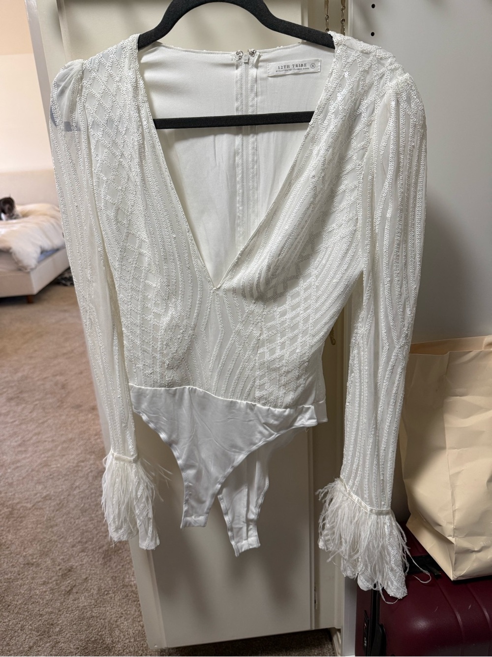 12th Tribe Ivory Plunge V-Neck Feather Cuff Bodysuit